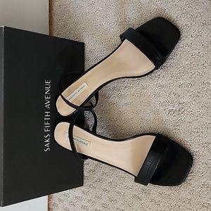 Saks Fifth Avenue black faux alligator leather heeled sandals.